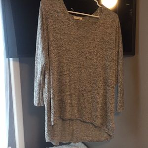 Long sleeve, short front, long back